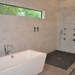 The 2 boxes in the wall are the all electronic controls for the showers.